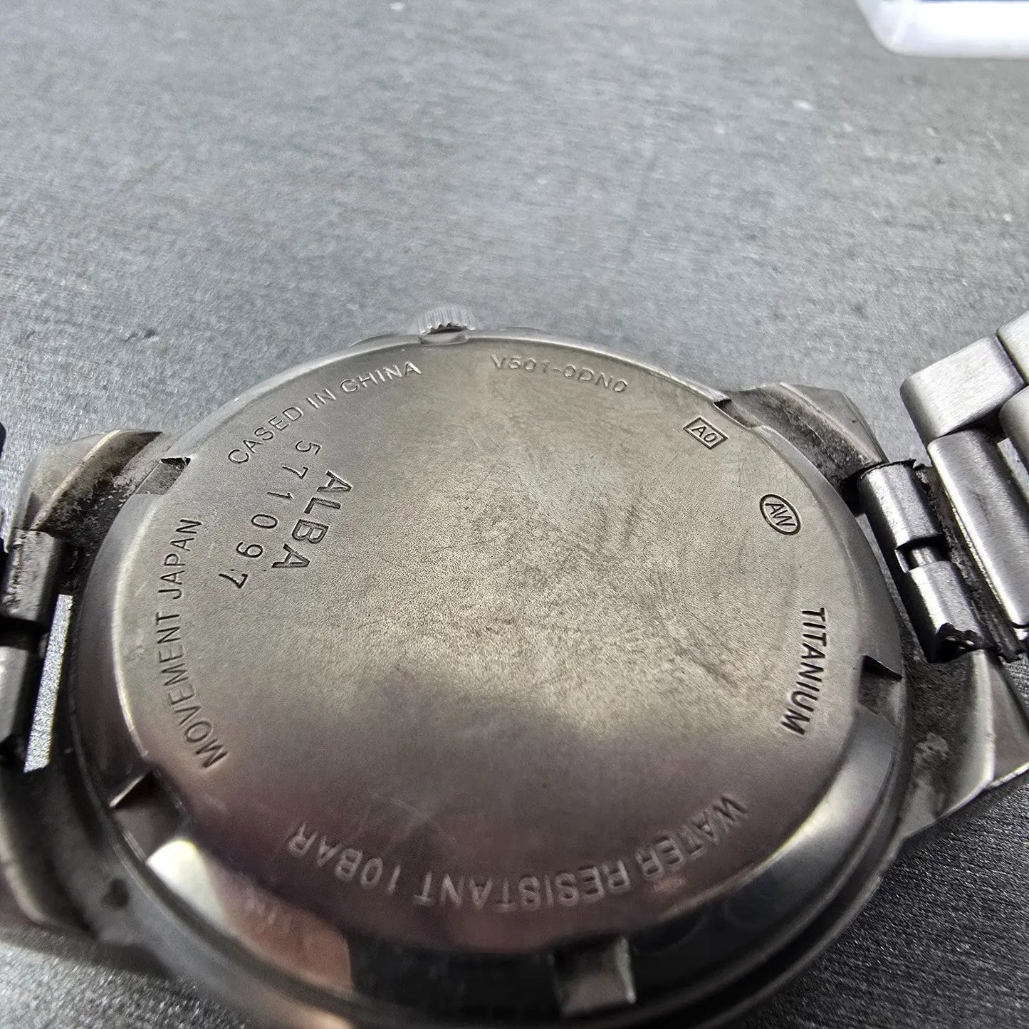 Seiko Alba Titanium Watch Men 35mm Silver Dial Silver Tone V501-0DN0 New Batt JN9