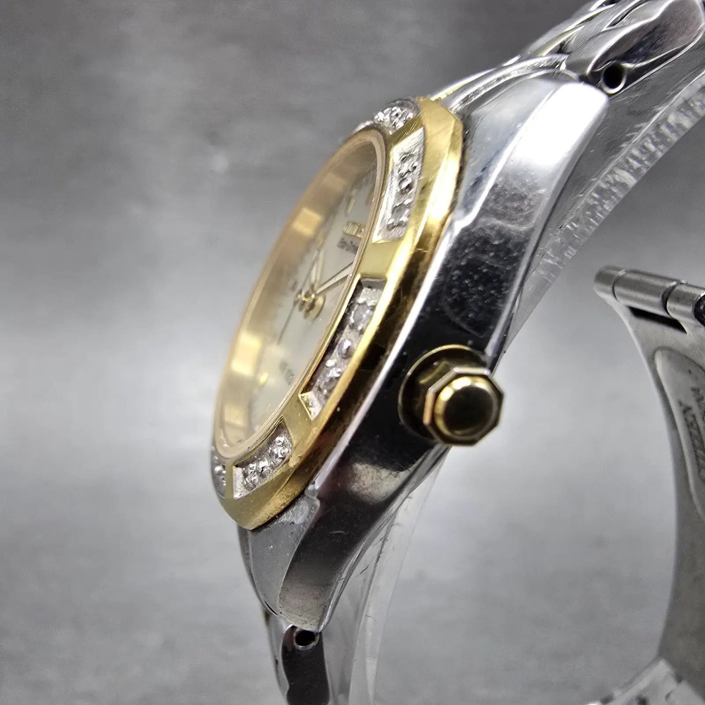 Citizen Eco-Drive Watch Women 26mm MOP Dial Two Tone Date Round EW1594-55D RunsK2