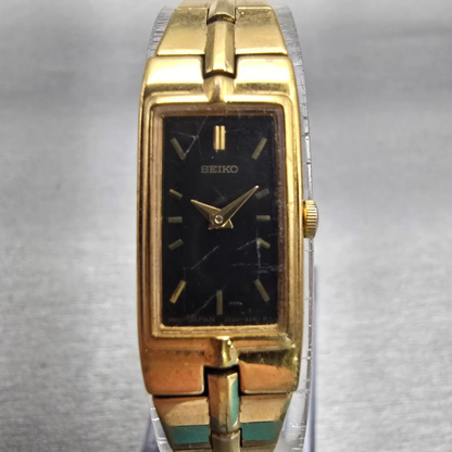 Seiko Watch Women 13mm Black Dial Gold Tone Rectangle 2E20-7479 New Battery VTG0