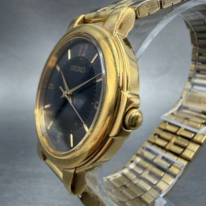 Seiko Watch Men 34mm Black Dial Gold Tone Round V701-2F30 New Battery Vintage2