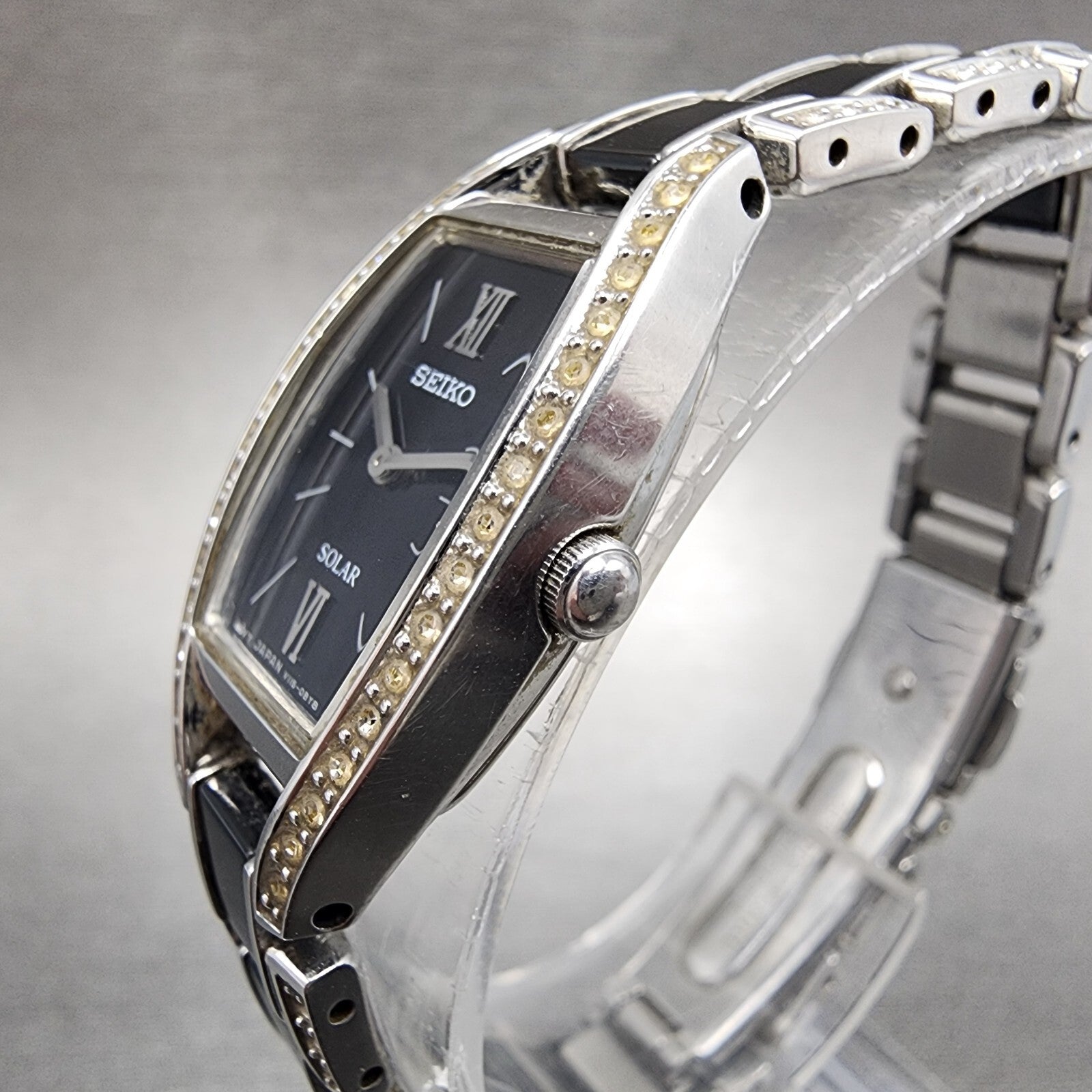 Seiko Solar Watch Women 19mm Black Dial Silver Tone Crystal Accent Runs V1150AY02