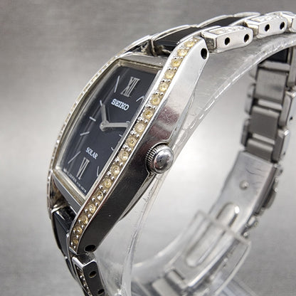 Seiko Solar Watch Women 19mm Black Dial Silver Tone Crystal Accent Runs V1150AY02
