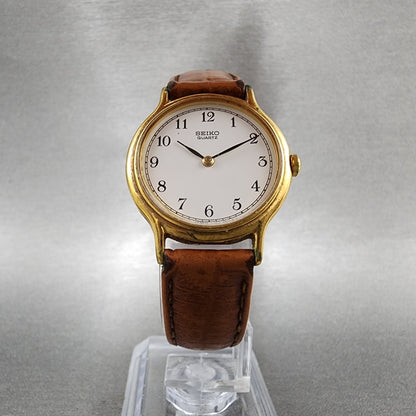 Seiko Watch Women 26mm White Dial Gold Tone Round V7006091 New Battery5