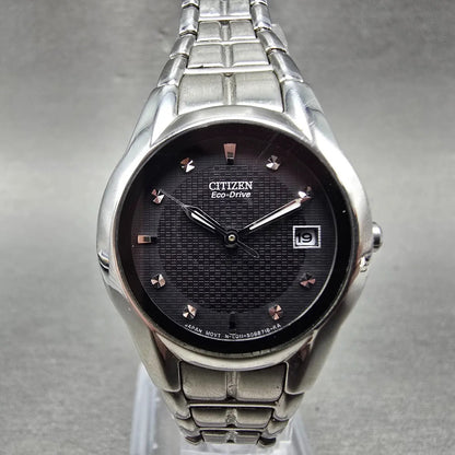 Citizen Eco-Drive Watch Women 25mm Black Dial Silver Tone Date E011-S058503 Runs0