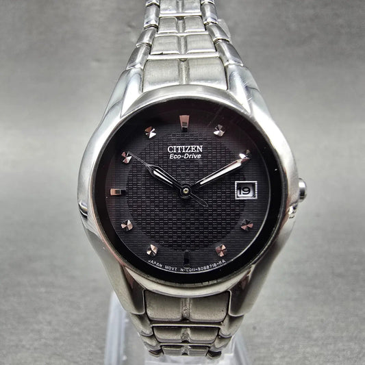 Citizen Eco-Drive Watch Women 25mm Black Dial Silver Tone Date E011-S058503 Runs0