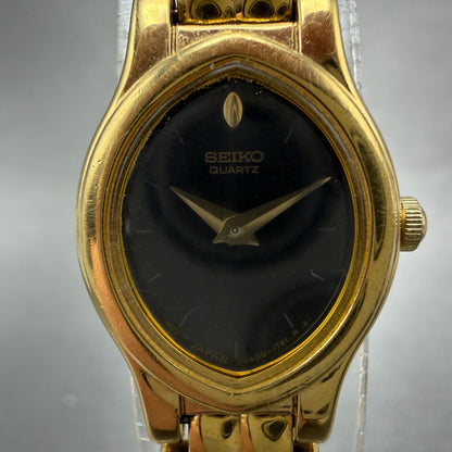 Seiko Watch Women 17mm Black Dial Gold Tone Oval V400-5588 New Battery Vintage1