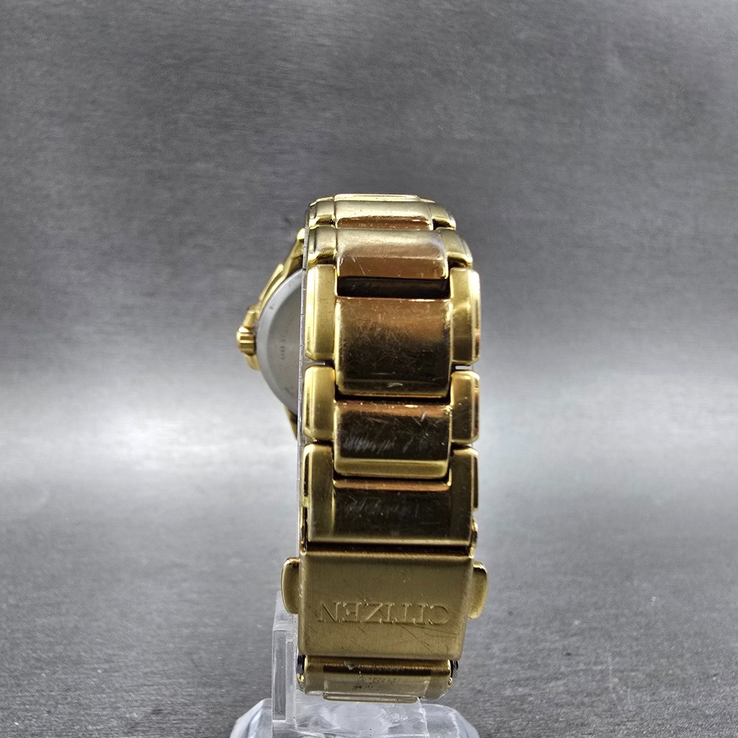 Citizen Eco-Drive Watch Women 30mm Silver Dial Gold Tone Date E013-S111676 Runs7