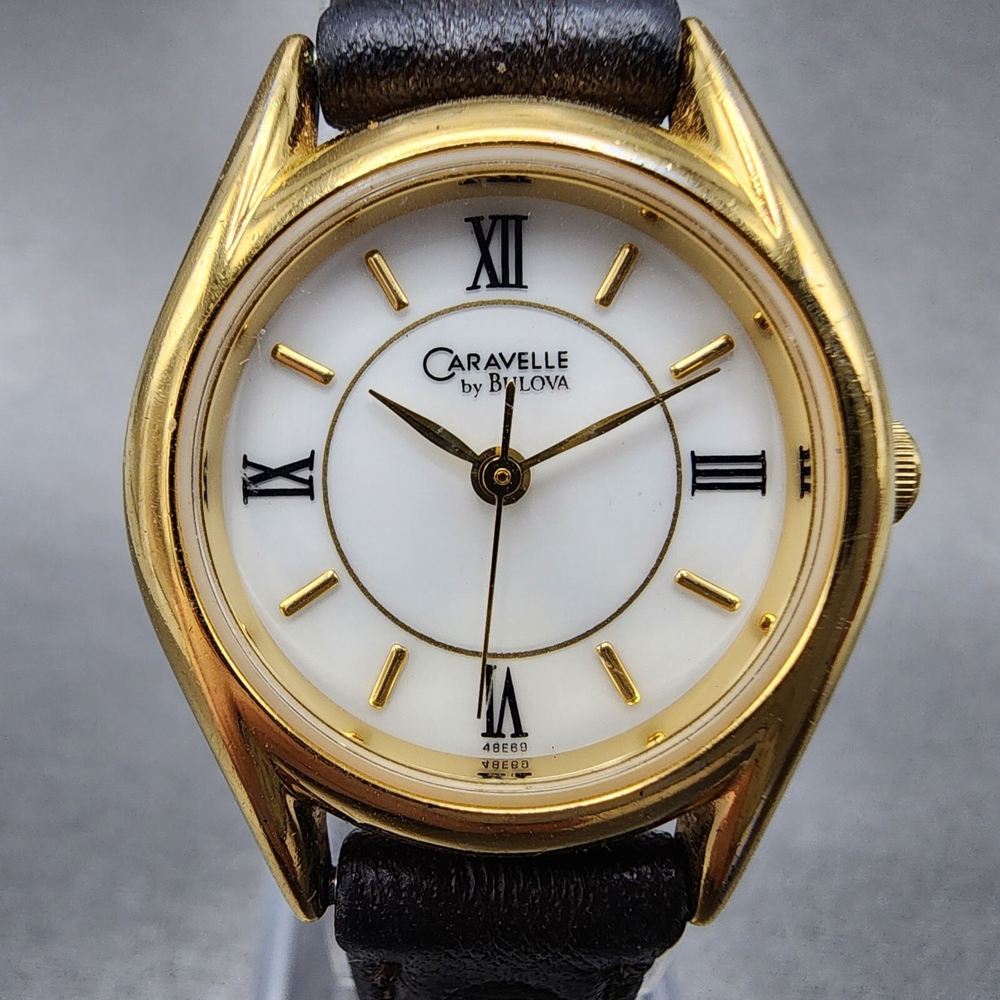 Bulova Caravelle Watch Women 24mm White Dial Gold Tone Round 48E69 New Battery1