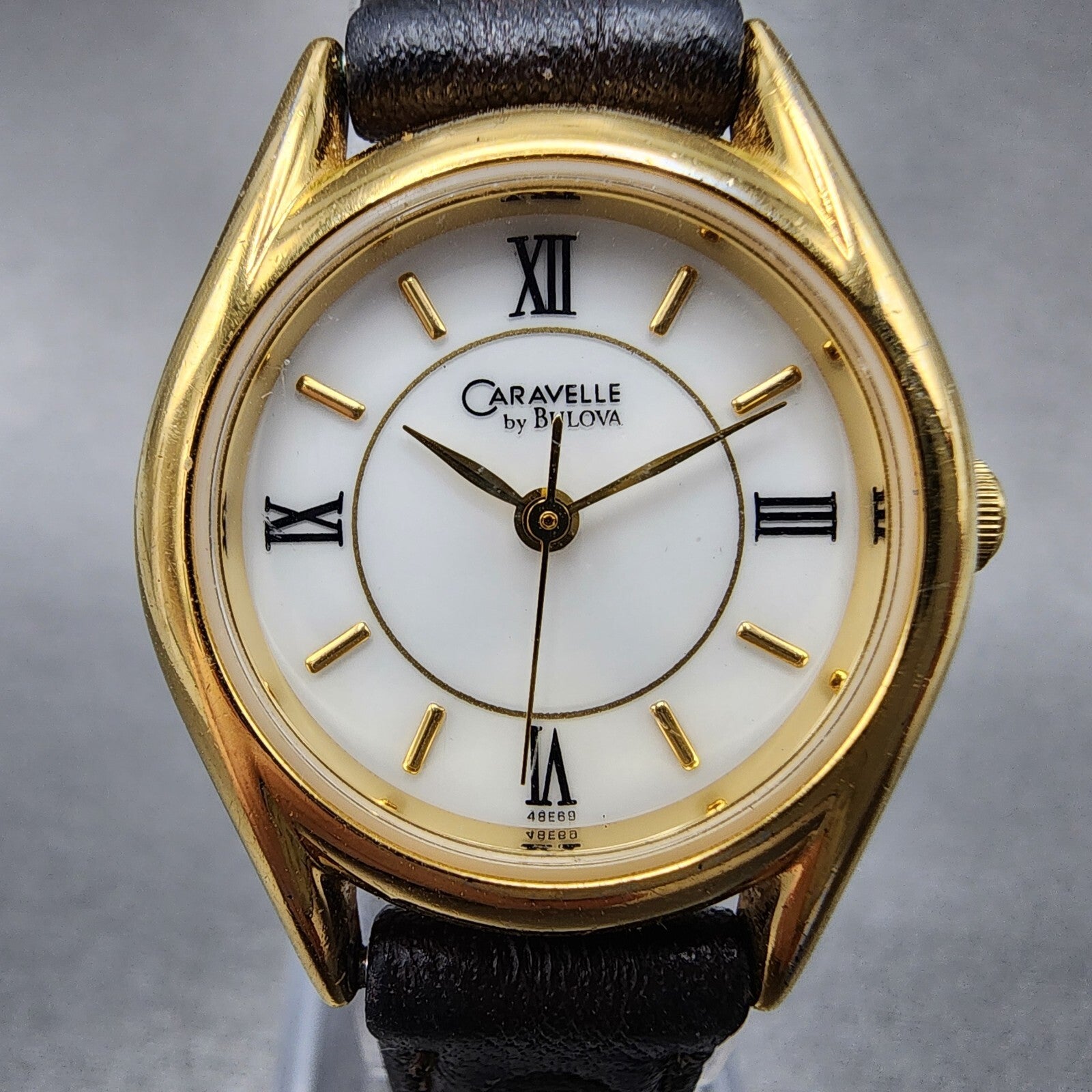 Bulova Caravelle Watch Women 24mm White Dial Gold Tone Round 48E69 New Battery1