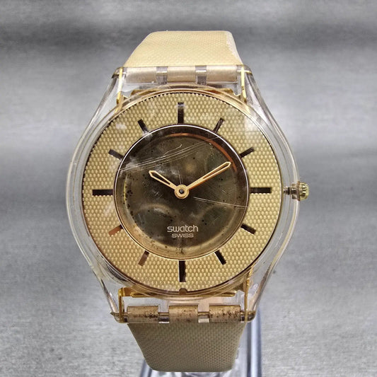 Swatch Skin THINE Watch Women Gold Dial Clear Case Round SFK155 New Battery0