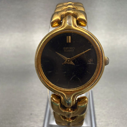 Seiko Watch Women 22mm Black Dial Gold Tone Date Round 7N82-0248 New Battery0