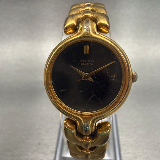 Seiko Watch Women 22mm Black Dial Gold Tone Date Round 7N82-0248 New Battery0