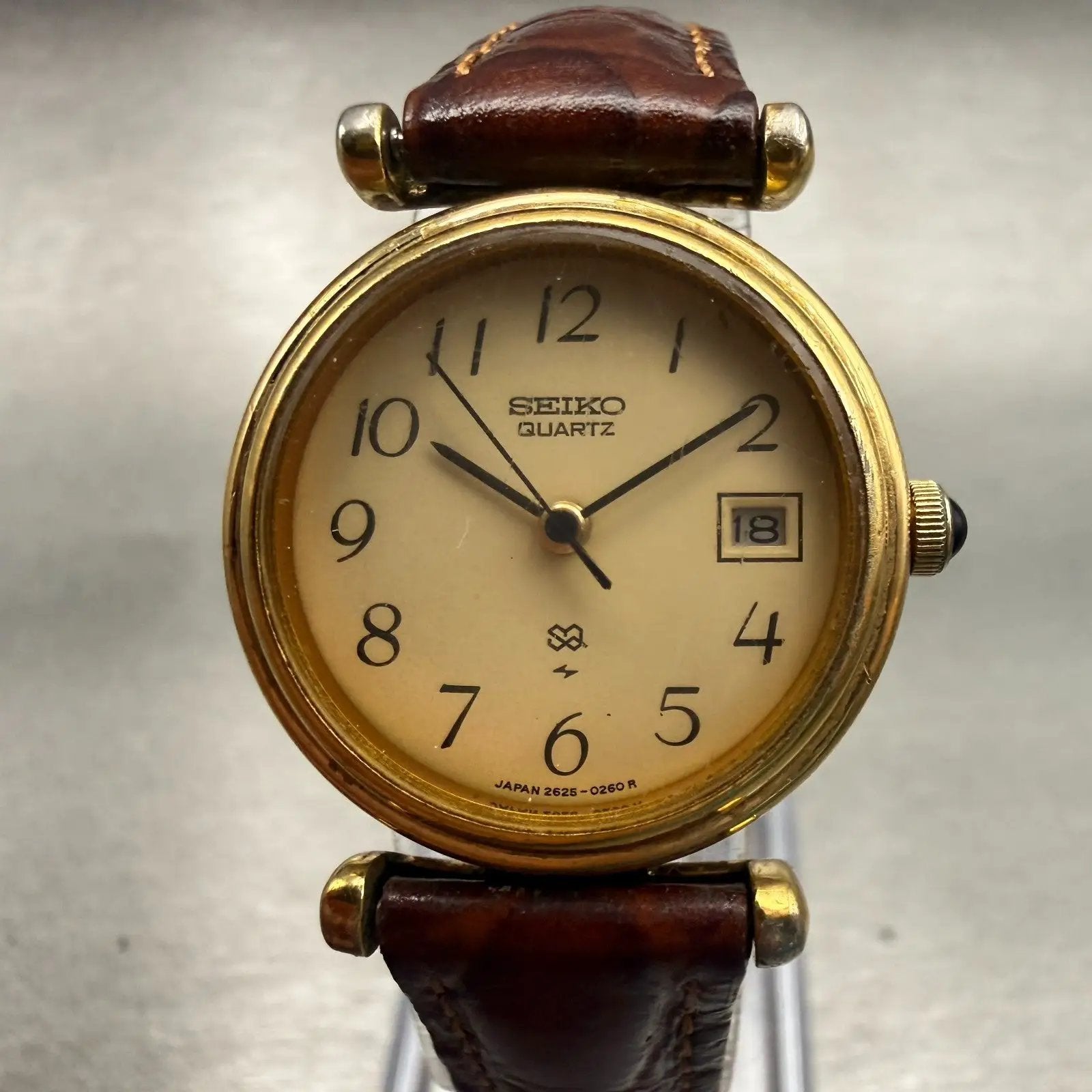 Seiko SQ Watch Women 24mm Champagne Dial Gold Tone Date Round 2625-0079 New Batt0