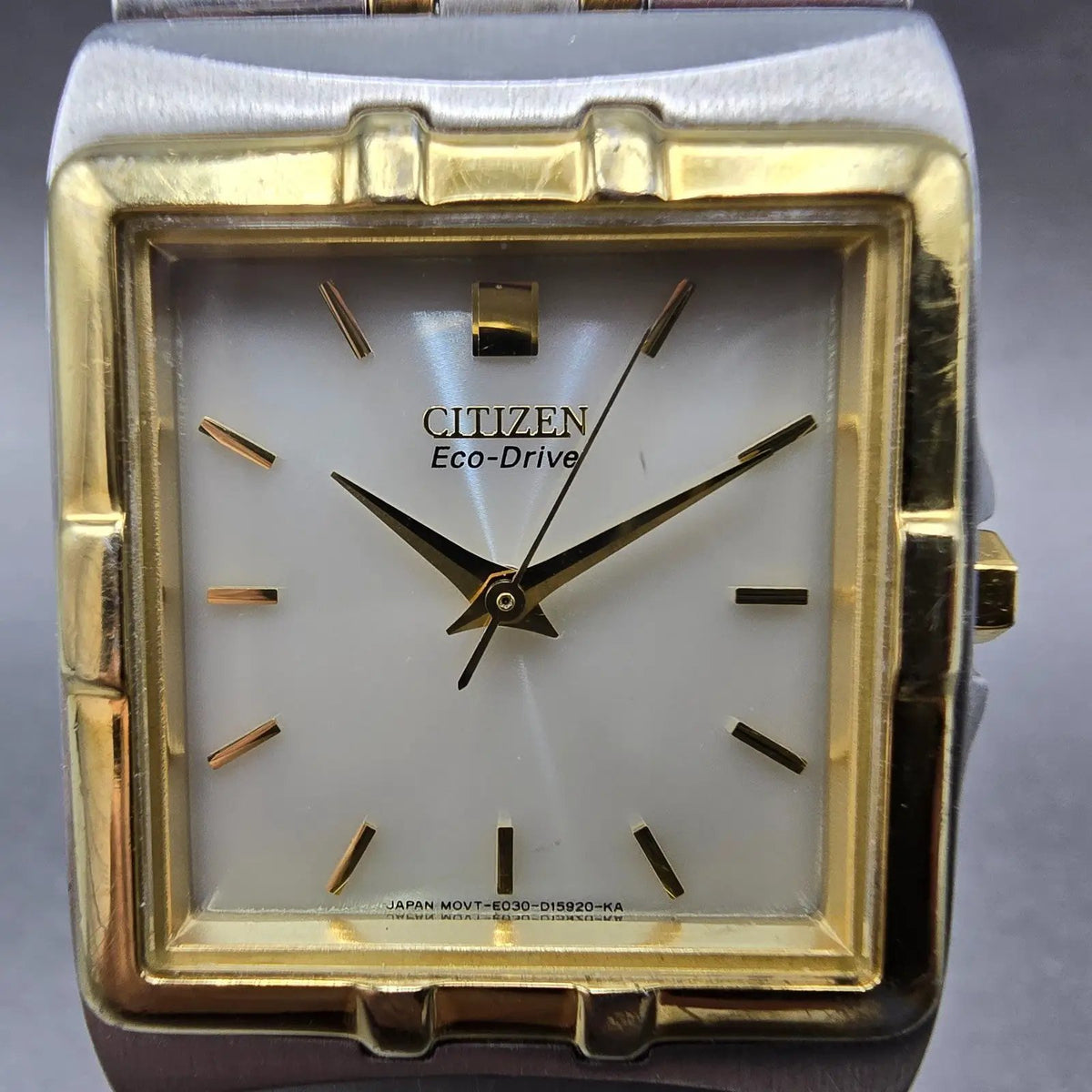 Citizen Eco-Drive Tank Watch Men 28mm White Dial Two Tone Rectangle E030 Works1