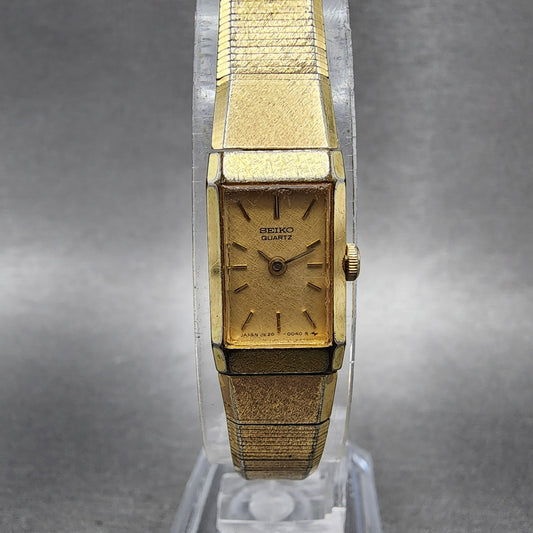 Seiko Tank Watch Women 12mm Champagne Dial Gold Tone 2e205029 New Battery0