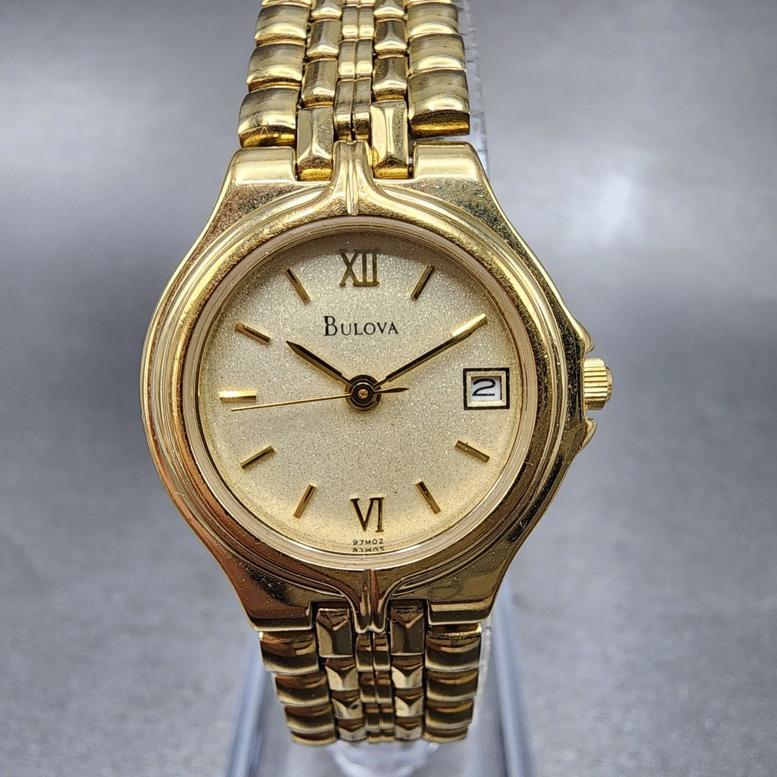 Bulova Watch Women 24mm Champagne Dial Gold Tone Date 97M02 New Battery0