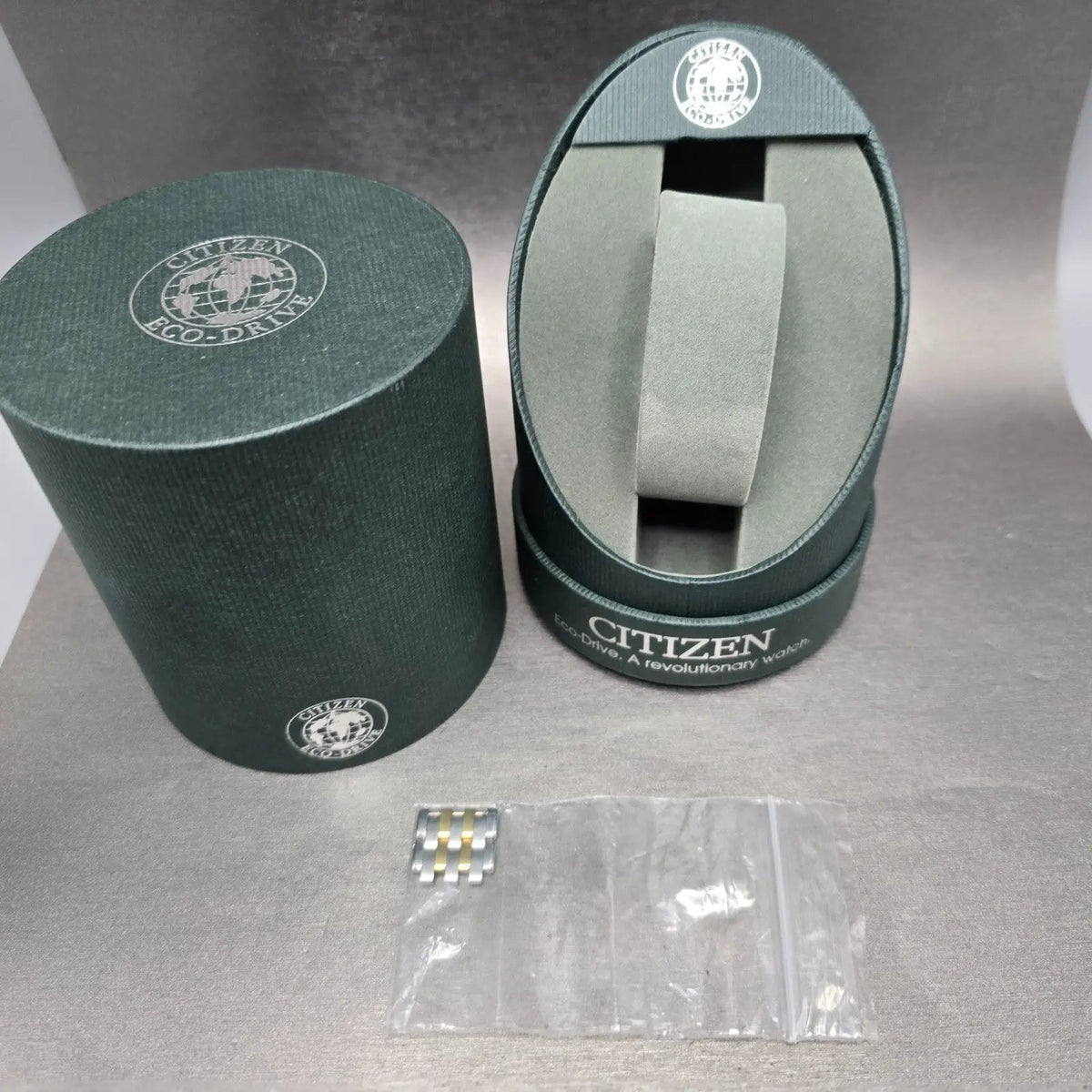 Citizen Eco-Drive Stiletto Watch Men 35mm White Dial Two Tone Round Runs WBox12