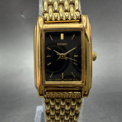 Seiko Tank Watch Women 18mm Black Dial Gold Tone Rectangle V401-5650 New Batt JO0
