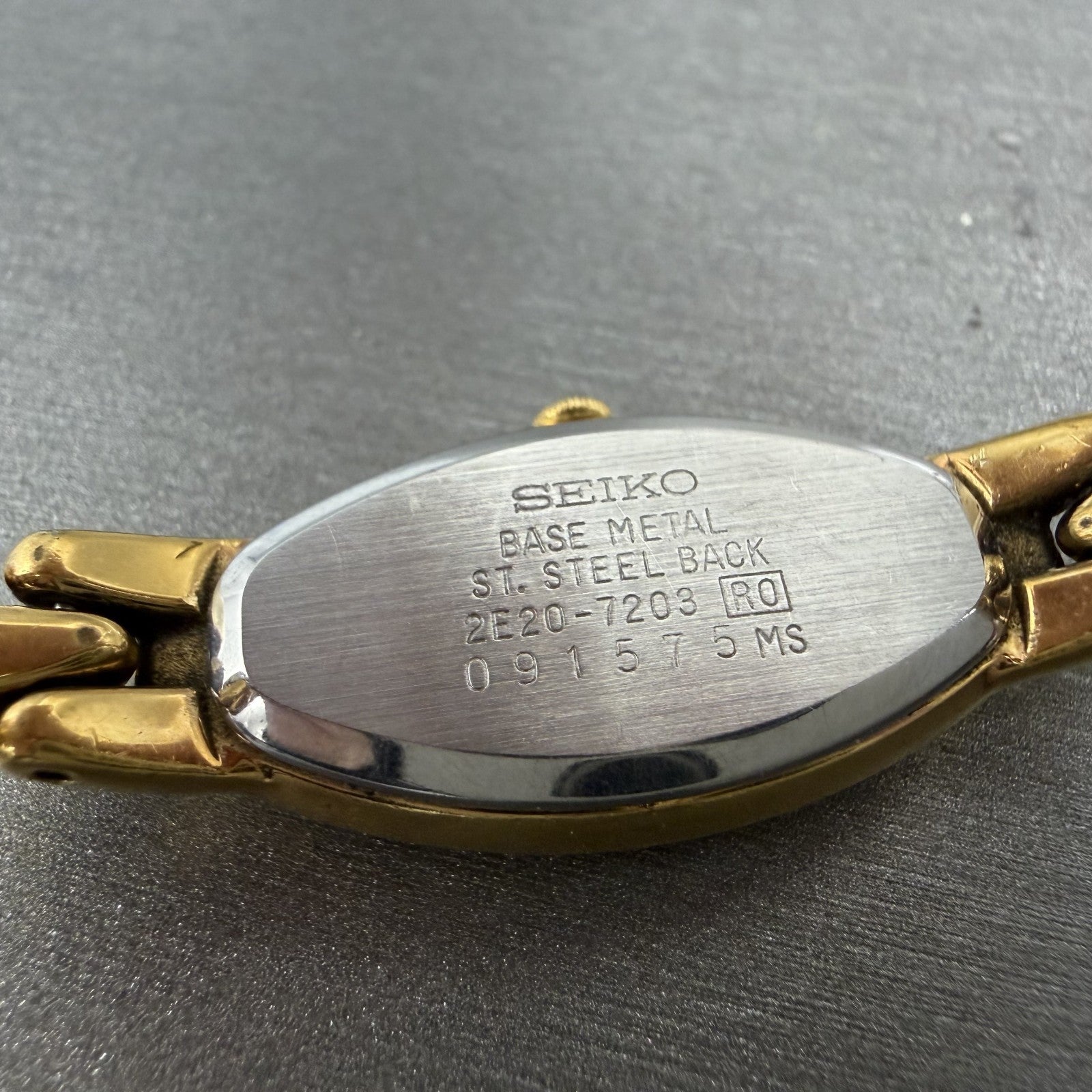 Seiko Watch Women 15mm Silver Dial Gold Tone Oval 2E207203 New Battery10