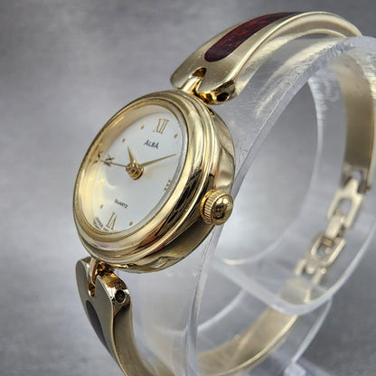 Alba Watch Women 20mm Champagne Dial Gold Tone Round Bangle V401019A New Batt2