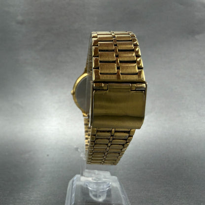 Seiko SX Watch Men 34mm Black Dial Gold Tone Round Vinatge V701-6K00 New Battery7