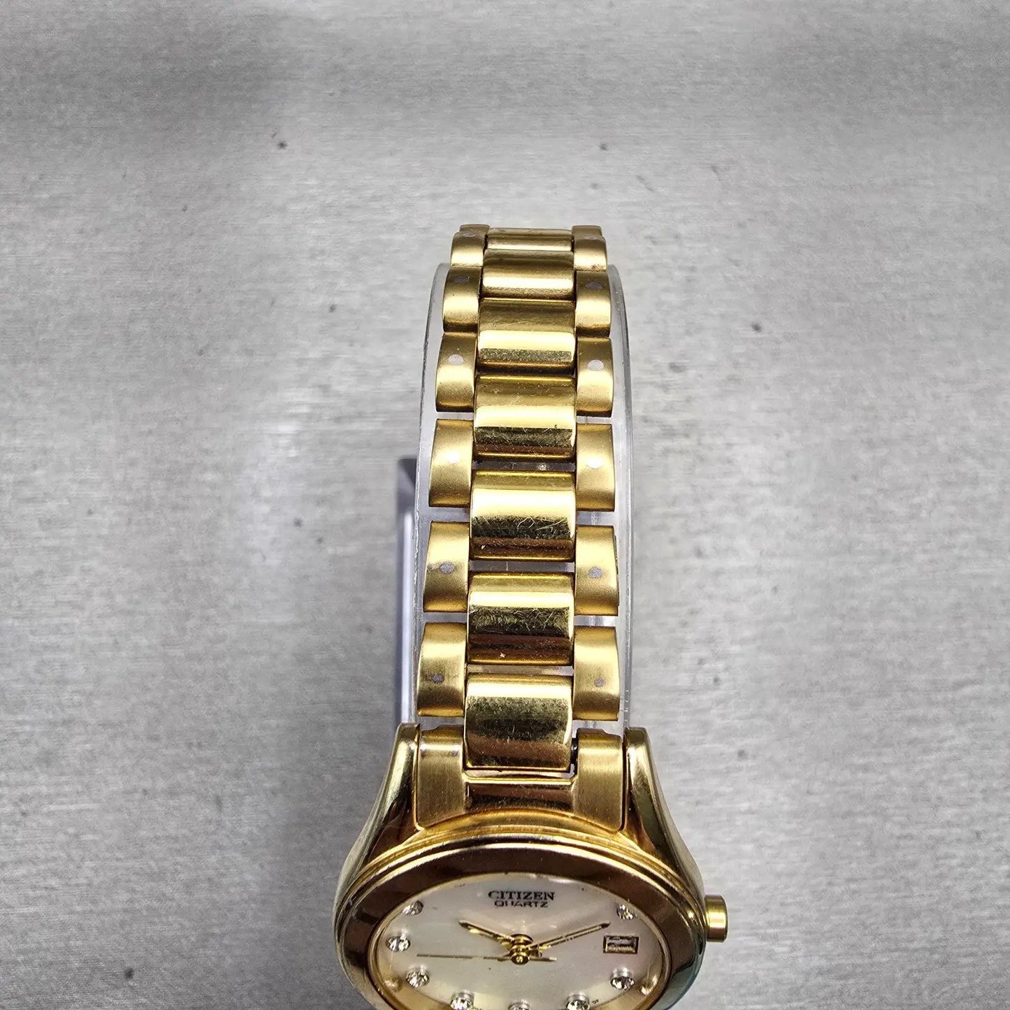 Citizen Watch Women 26mm MOP Dial Gold Tone Date Round 1012-S075688 New Battery4