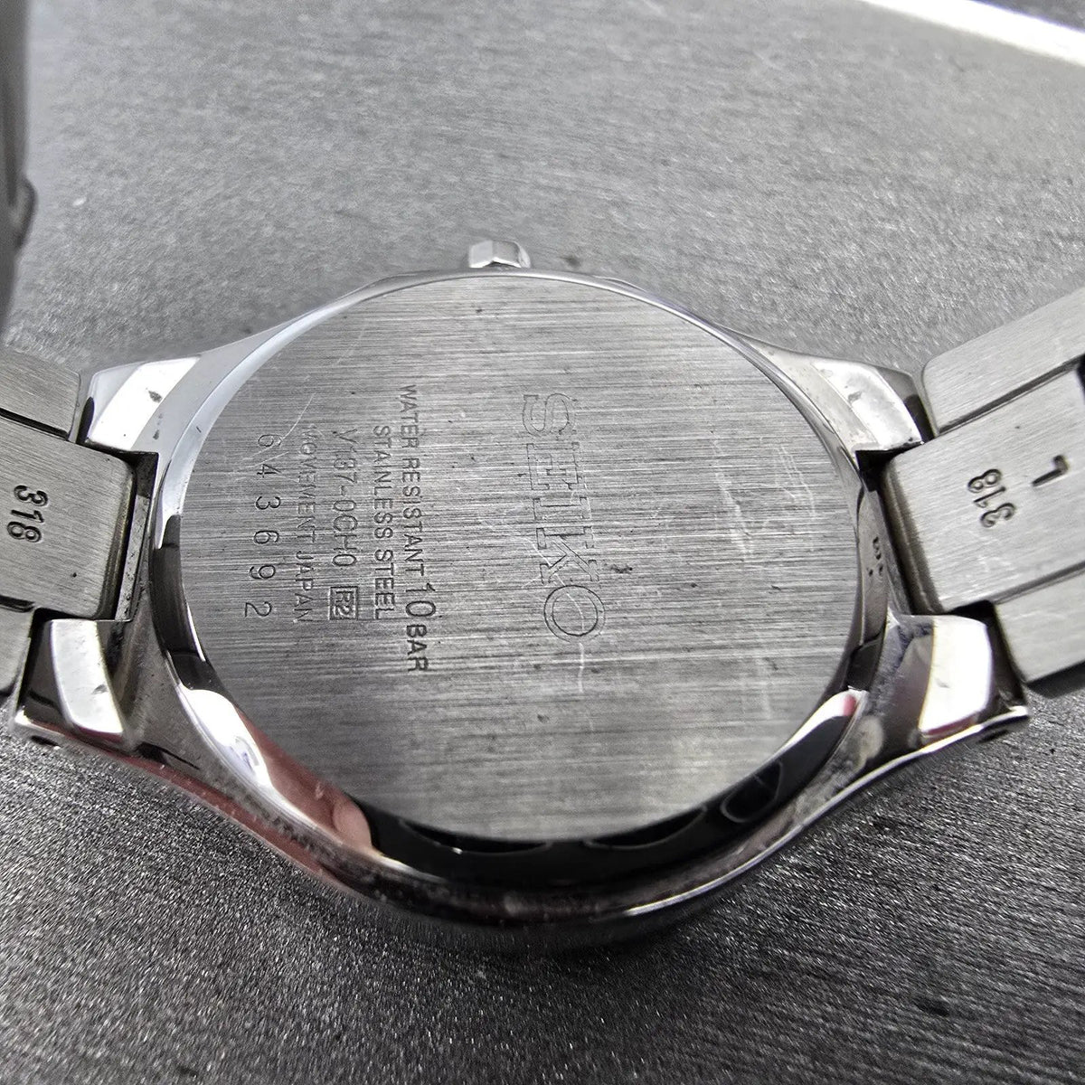 Seiko Solar Watch Women 27mm Pink Dial Silver Date Round V137-0CH0 Runs9