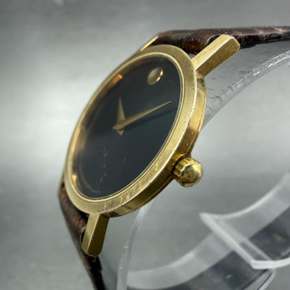 Movado Museum Watch Women 25mm Black Dial Gold Tone Round 87-25-832 New Batt ABC2