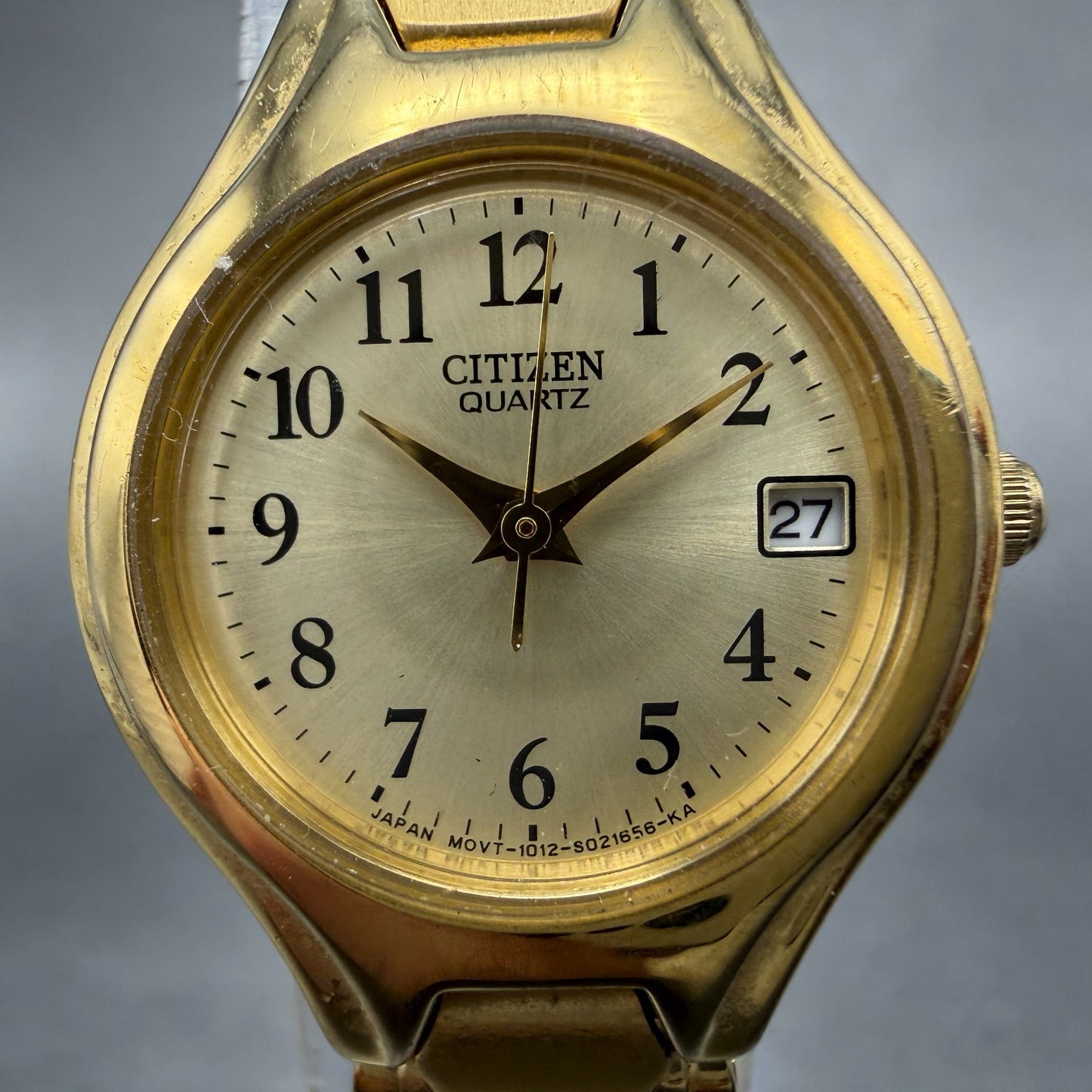 Citizen Watch Women 23mm Champagne Dial Gold Tone Round Date 1012-S072689 NewBat1