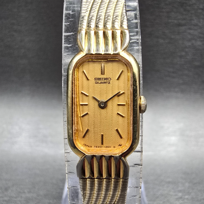 Seiko Tank Watch Women 12mm Gold Dial Gold Tone Rectangle 2E20-6019 New BatteryJ0