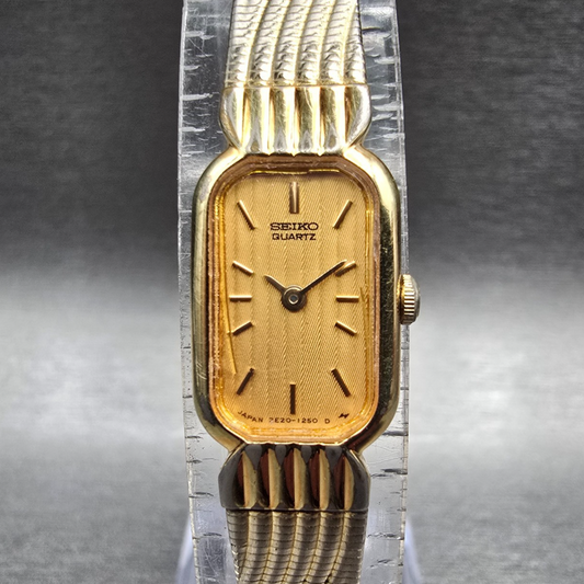 Seiko Tank Watch Women 12mm Gold Dial Gold Tone Rectangle 2E20-6019 New BatteryJ0