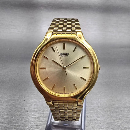 Seiko Watch Men 34mm Champagne Dial Gold Tone Round V701-6K69 New Battery VTG0