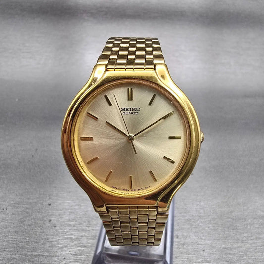 Seiko Watch Men 34mm Champagne Dial Gold Tone Round V701-6K69 New Battery VTG0