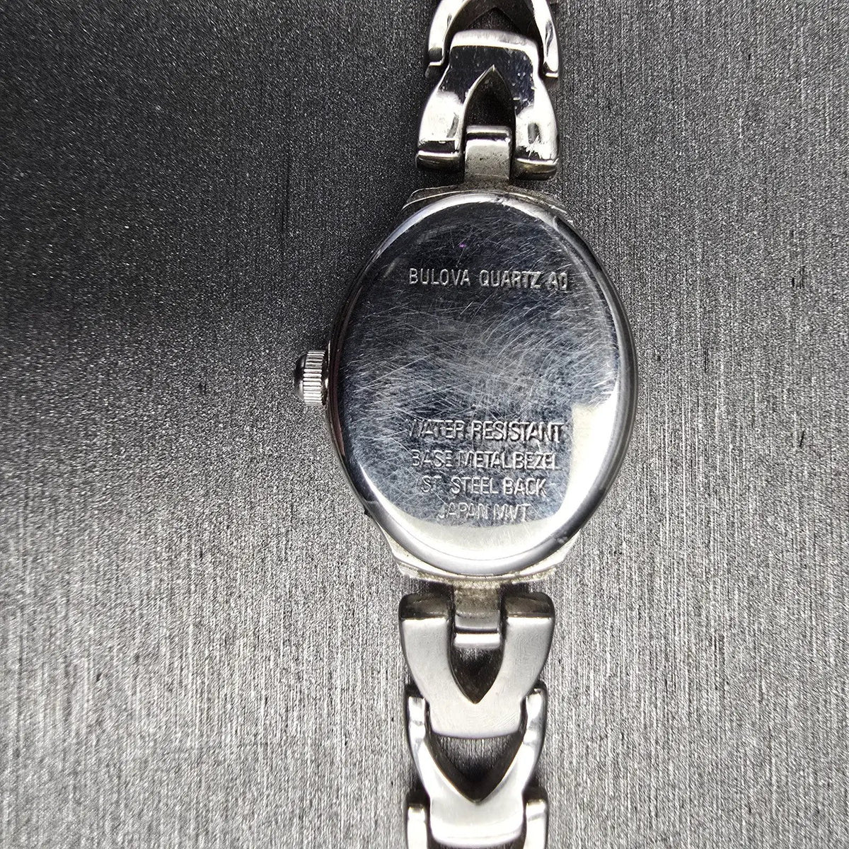 Bulova Watch Women 17mm White Dial Silver Tone Oval 96L12 New Battery JP 4510
