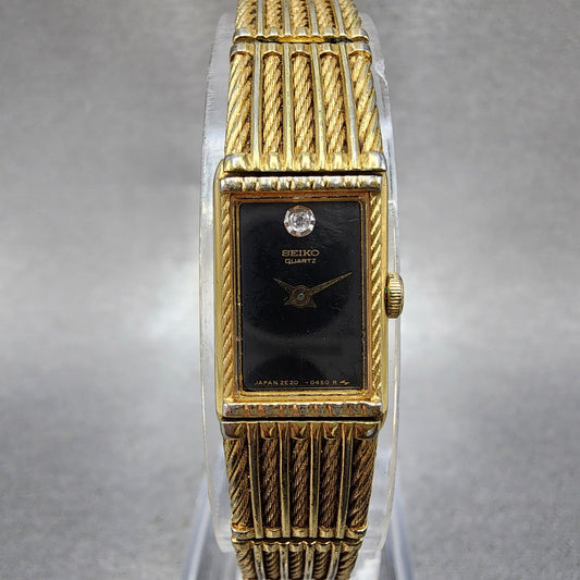 Seiko Tank Watch Women 12mm Black Dial Gold Tone 2e205269 New Battery0