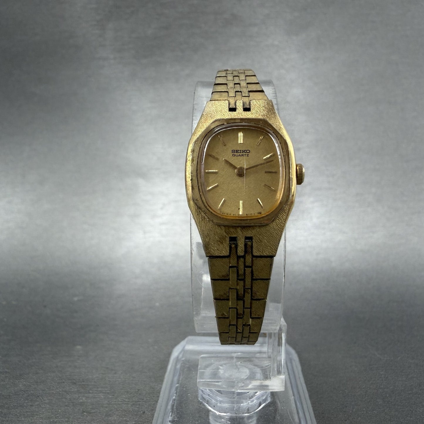 Seiko Watch Women 17mm Champagne Dial Gold Tone Rectangle 2C20-5749 New Batt ABD5