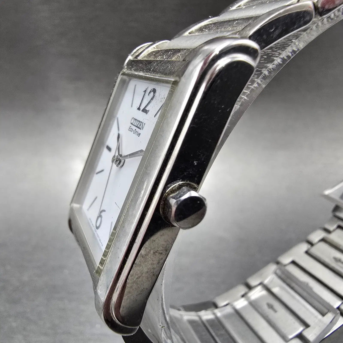 Citizen Eco-Drive Tank Watch Men 26mm White Dial Silver Date Rectangle Runs2
