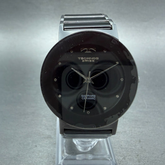 Technos Watch Men 33mm Black Dial Silver Tone Round TBM674 New Battery0