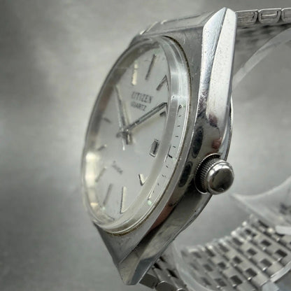 Citizen Seven Watch Men 35mm Silver Dial Silver Tone date 2110-942191 NewBattery2