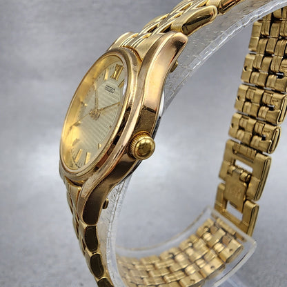 Seiko watch Women 24mm Champagne Dial Gold Tone Round V4011600 New Battery2