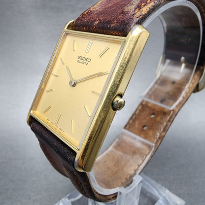 Seiko Tank Watch Men 25mm Gold Dial Gold Tone Rectangle 7N00-5B29 New Battery