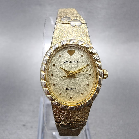 Waltham Watch Women 18mm Champagne Dial Gold Tone Oval 6L32 New Battery Hearts0