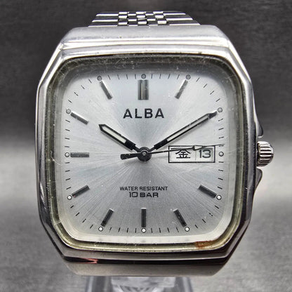 Seiko Alba Watch Men 32mm Silver Dial Silver Tone Daydate 7N33-K003 New Battery1
