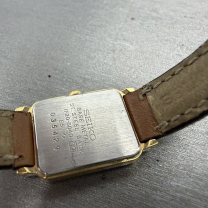 Seiko Tank Watch Women 17mm White Dial Gold Tone Rectangle 1F20-5D40 New Battery9