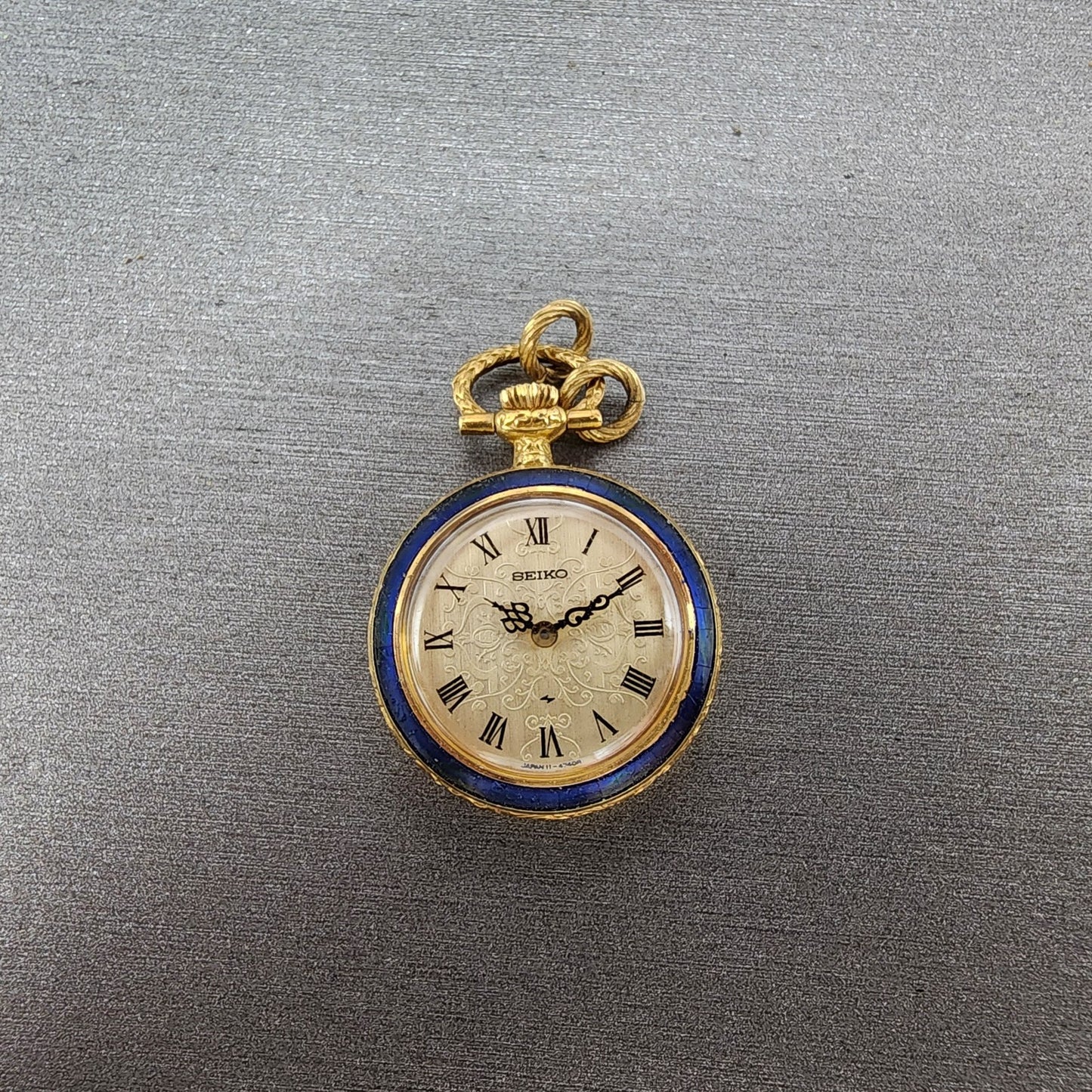 Seiko Pendent Watch Women 23mm Champagne Dial Gold & Blue Tone Manual Runs0