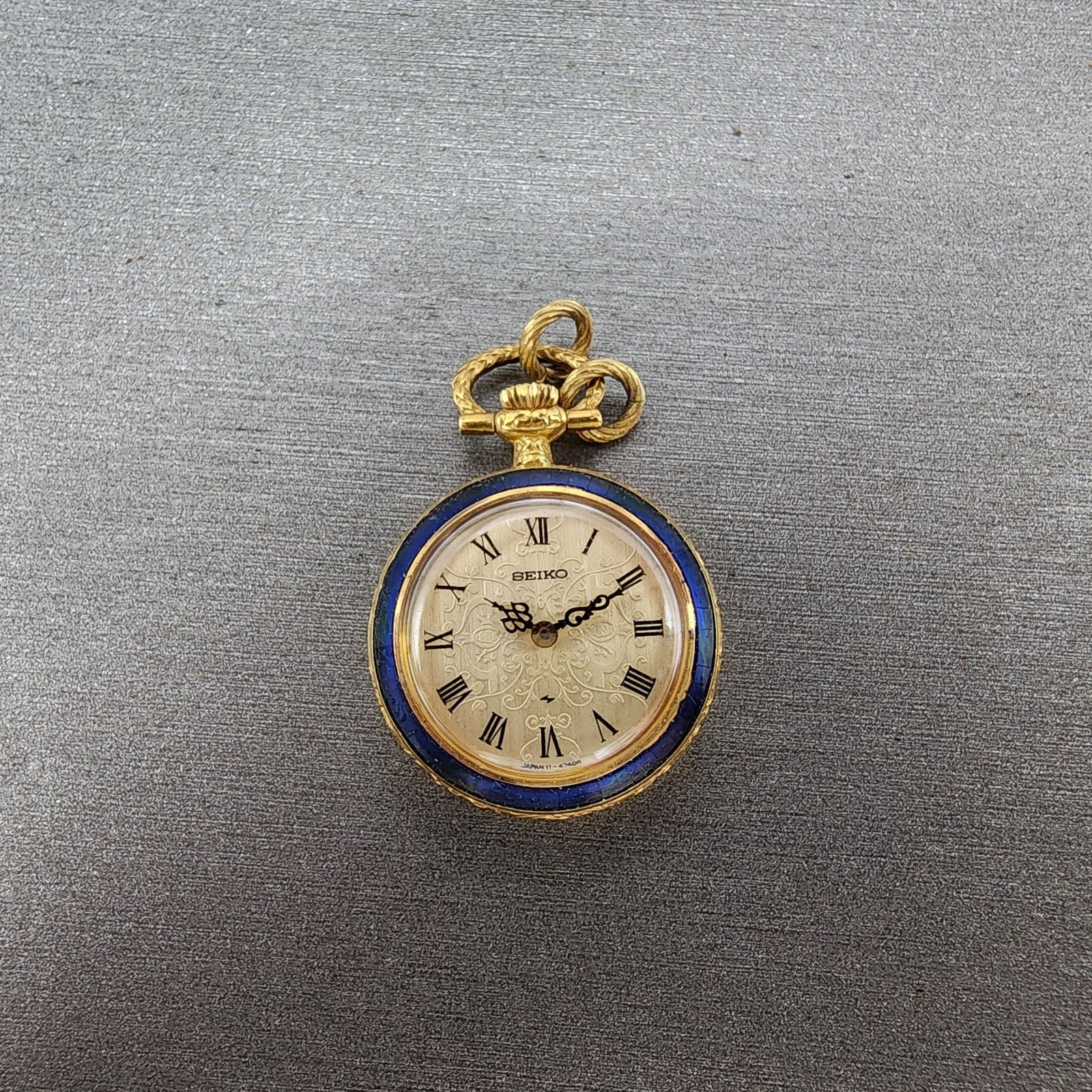 Seiko Pendent Watch Women 23mm Champagne Dial Gold & Blue Tone Manual Runs0