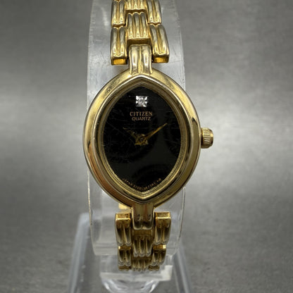 Citizen Watch Women 16mm Black Dial Gold Tone Oval 3220326091 New Battery0
