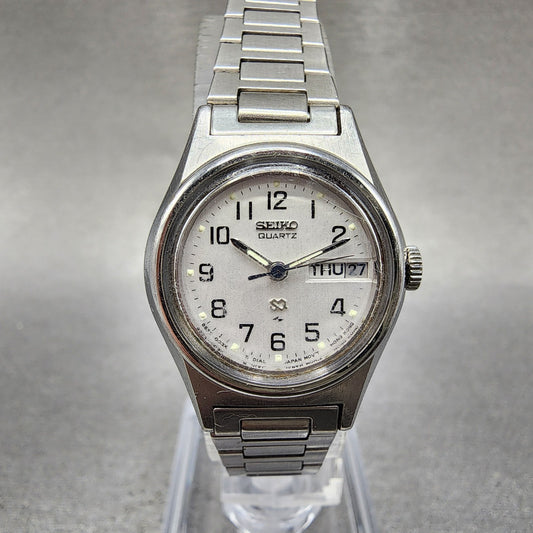 Seiko SQ Watch Women 23mm Silver Dial Silver Tone Daydate 85230039 New Battery0
