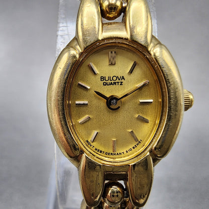 Bulova Watch Women 17mm Champagne Dial Gold Tone Oval 92H51 New Battery1