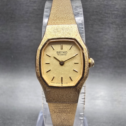Seiko Womens Watch 17mm Champagne Dial Gold Tone Oval 2P20-5H39 New Battery0